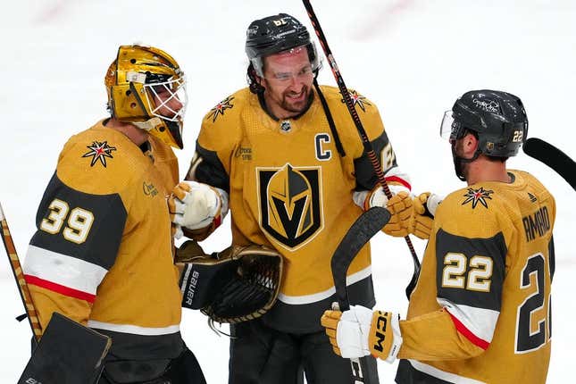 Apr 20, 2023; Las Vegas, Nevada, USA; Vegas Golden Knights forward Mark Stone (61) celebrates with goaltender Laurent Brossoit (39) and right wing Michael Amadio (22) after defeating the Winnipeg Jets 5-2 in game two of the first round of the 2023 Stanley Cup Playoffs at T-Mobile Arena.