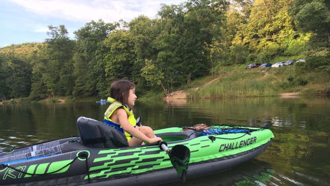 little girl in a kayak