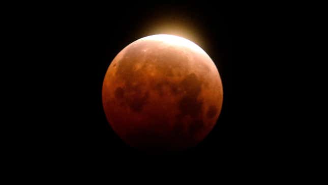 A total lunar eclipse is seen over Santa Monica Beach in Santa Monica, Calif., Wednesday, May 26, 2021. The first total lunar eclipse in more than two years is coinciding with a supermoon for quite a cosmic show.