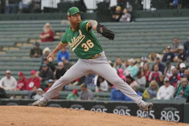 Mar 21, 2023; Tempe, Arizona, USA; Oakland Athletics starting pitcher Adam Oller (36) throws against the Los Angeles Angels in the first inning at Tempe Diablo Stadium.