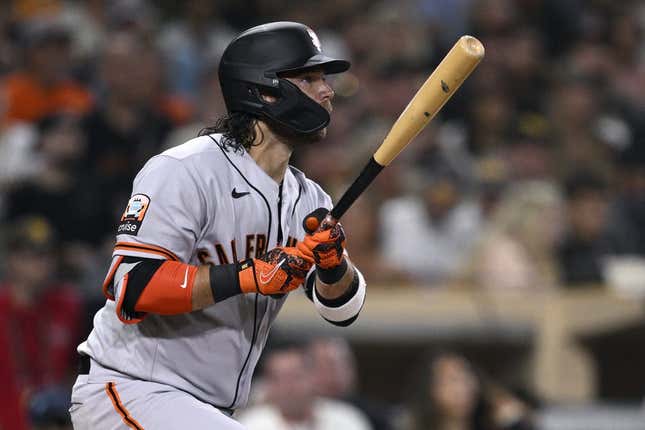 Sep 1, 2023; San Diego, California, USA; San Francisco Giants shortstop Brandon Crawford (35) hits a sacrifice fly against the San Diego Padres during the fourth inning at Petco Park.
