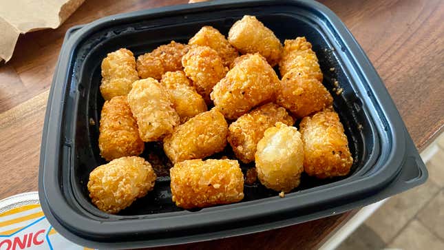 The BBQ Chip Seasoned Tots were orange-ish. The seasoning was uneven and collected in the oil in the container. 