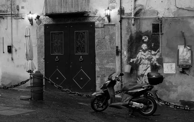 Like a prayer: Banksy’s Madonna mural. (Source: Therese Trinko/Flickr, CC BY-NC-SA via The Conversation)