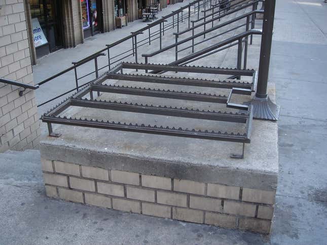 Besides being an eye-sore, these wrought iron additions serve no purpose other than to make a potentially pleasant space in New York City distinctly unpleasant.