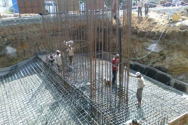 Construction workers in Kerala. Many Indians have long hours of outdoor heat exposure in summer because of the nature of their work.