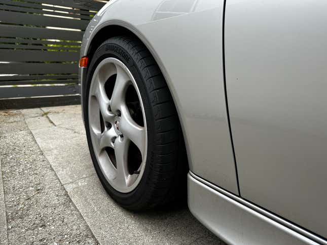 The left front wheel of a 2003 Porsche 911 Carrera