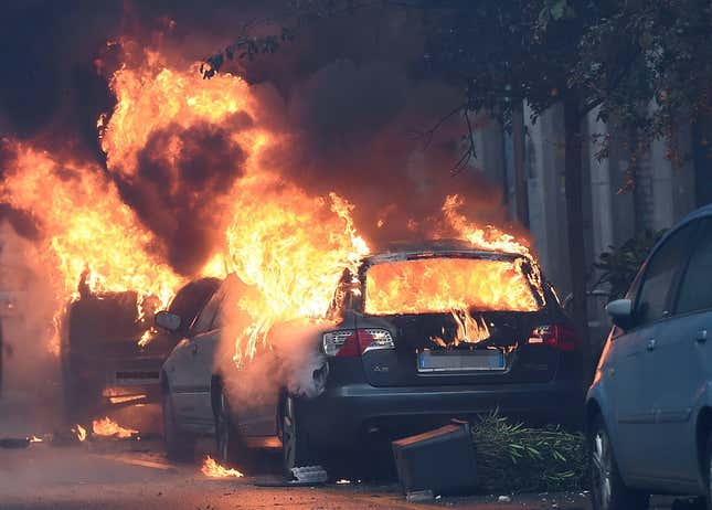 Cars were set on fire as protesters clashed with police.