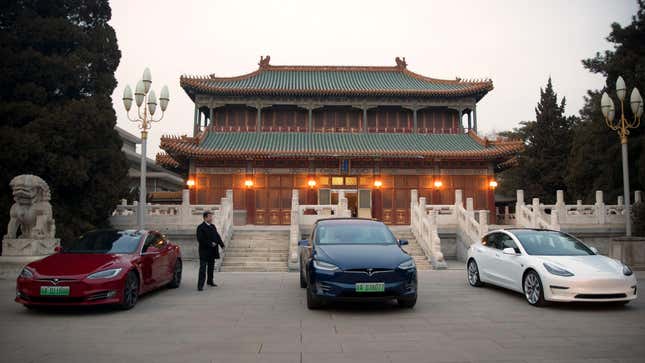 Tesla vehicles are parked outside of a building at the Zhongnanhai leadership compound during a meeting between Tesla CEO Elon Musk and Chinese Premier Li Keqiang on January 9, 2018 in Beijing, China.