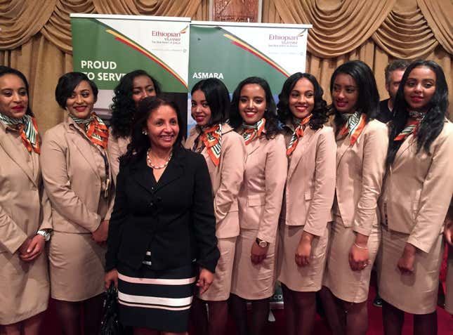 Ethiopian Airlines cabin crew pose for a photograph as they resume flights to Eritrea's capital Asmara at the Bole International Airport in Addis Ababa, Ethiopia July 18, 2018.