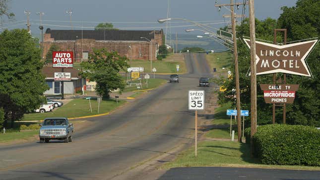 A photo of a road running through a town in Oklahoma. 