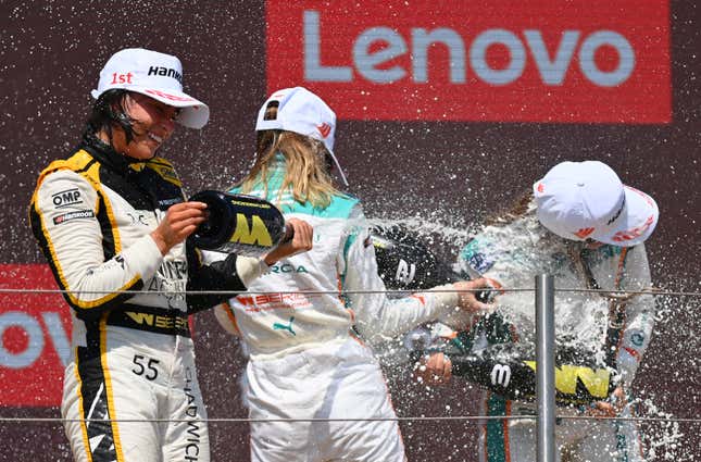 Race winner Jamie Chadwick of Great Britain and Jenner Racing (left), second placed Belen Garcia of Spain and Quantfury W Series Team, and third placed Nerea Marti of Spain and Quantfury W Series Team celebrate on the podium during the W Series Round 4 race at Circuit Paul Ricard in July.