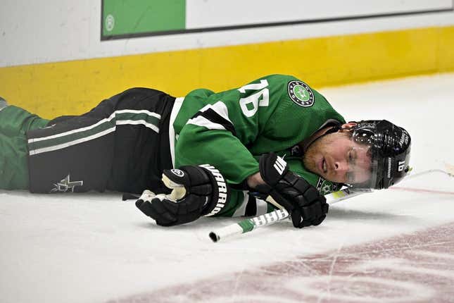 Apr 17, 2023; Dallas, Texas, USA; Dallas Stars center Joe Pavelski (16) lies on the ice after getting hit by Minnesota Wild defenseman Matt Dumba (not pictured) during the second period in game one of the first round of the 2023 Stanley Cup Playoffs at the American Airlines Center.
