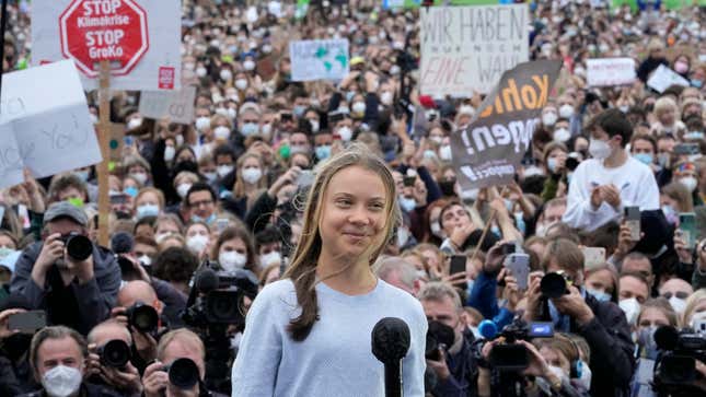 Greta Thunberg stands onstage during a Fridays for Future global climate strike in Berlin, Germany.
