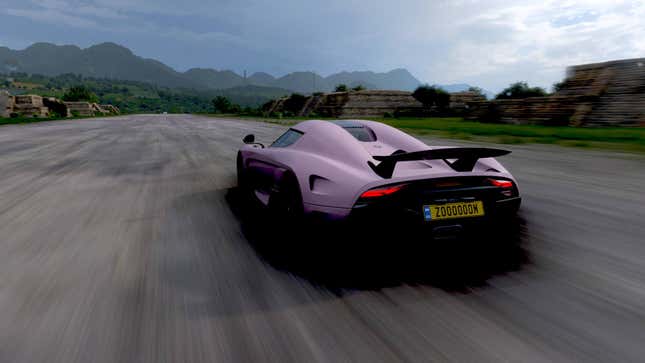 A Koenigsess speeds down a drag strip in Forza Horizon 5.