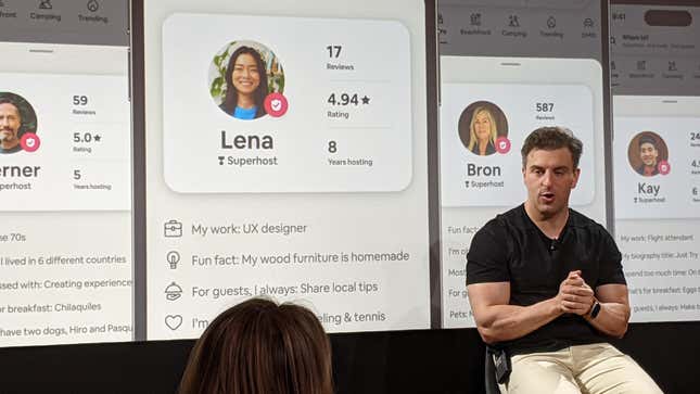 Airbnb CEO Brian Chesky sits and speaks next to a screen showing Host Passport feature.