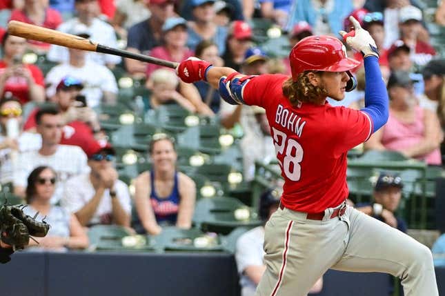 Sep 3, 2023; Milwaukee, Wisconsin, USA; Philadelphia Phillies first baseman Alec Bohm (28) hits a solo home run in the seventh inning against the Milwaukee Brewers at American Family Field.