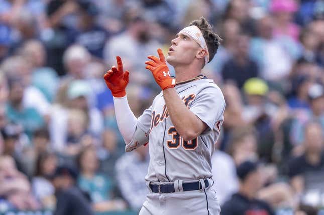 Jul 15, 2023; Seattle, Washington, USA; Detroit Tigers right fielder Kerry Carpenter (30) celebrates while rounding the bases after hitting a solo home run \of Seattle Mariners starting pitcher George Kirby (68) during the second inning at T-Mobile Park.