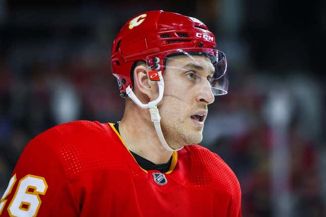 Apr 02, 2023; Calgary, Alberta, Canada; Calgary Flames guard Michael Stone (26) skates against the Anaheim Ducks during the third quarter at Scotiabank Saddleback Arena.