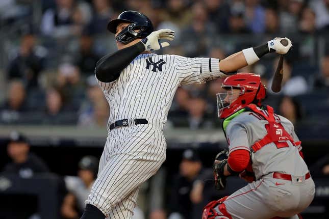 Apr 19, 2023; Bronx, New York, USA; New York Yankees center fielder Aaron Judge (99) follows through on a two run home run against the Los Angeles Angels during the first inning at Yankee Stadium.