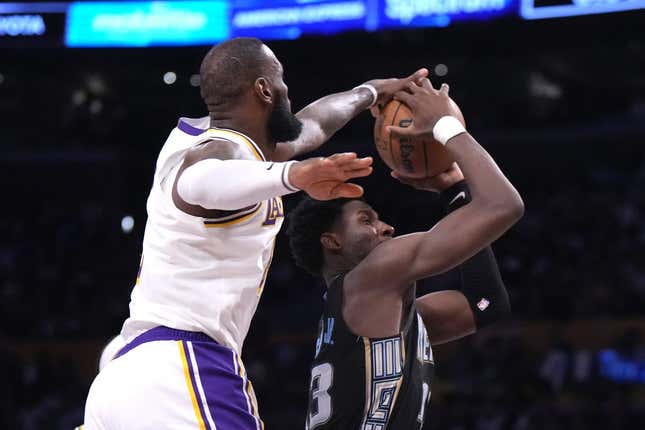 Apr 22, 2023; Los Angeles, California, USA; Los Angeles Lakers forward LeBron James (6) blocks a shot by Memphis Grizzlies forward Jaren Jackson Jr. (13) in the fourth quarter during game three of the 2023 NBA playoffs at Crypto.com Arena.