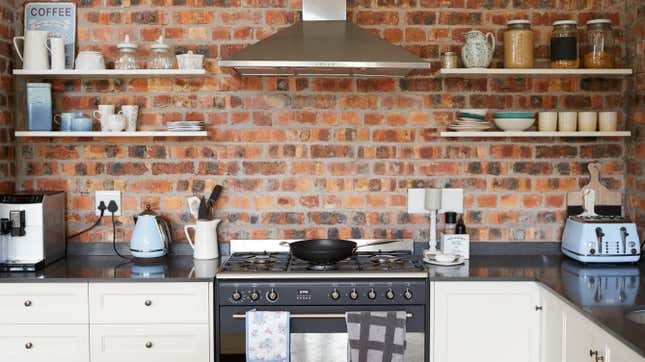 exposed brick wall in modern kitchen