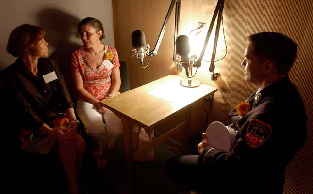 Firefighter John Feehan and his sisters Tara Davan and Liz Feehan who lost their father 1st Deputy Commissioner Bill Feehan, the highest ranking and oldest fireman to die at the World Trade Center, sit in the new StoryCorps recording booth at the World Trade Center site in New York July 12, 2005.