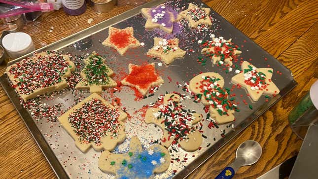 Gluten-free, dairy-free cutout Christmas sugar cookies on baking tray