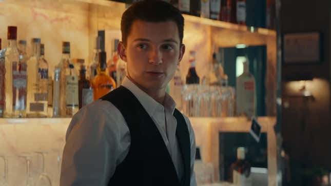 Nathan Drake wears a black waistcoat and shakes cocktails at a Manhattan cocktail lounge in the Uncharted movie.