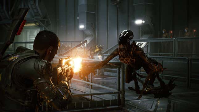 A soldier shoots an alien on a spaceship in Aliens Fireteam Elite.