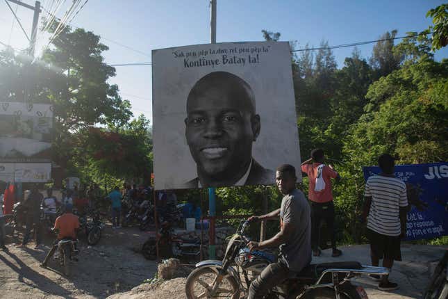 A poster features slain Haitian President Jovenel Moise in Port-au-Prince, Haiti, Thursday, July 7, 2022.