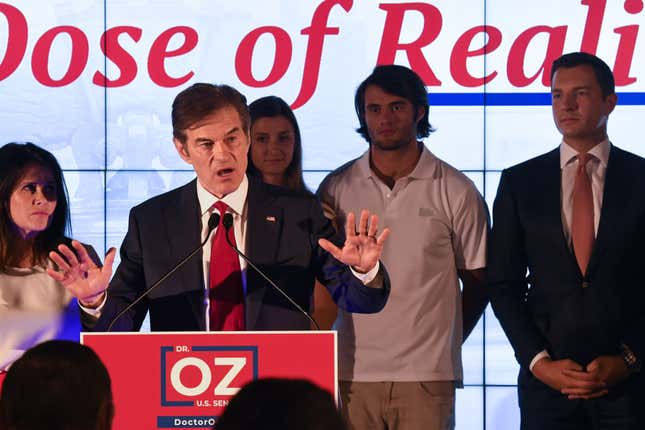 Republican U.S. Senate candidate Mehmet Oz greets supporters after the primary race resulted in an automatic re-count due to close results on May 17, 2022, in Newtown, Pennsylvania. Television personality Oz, endorsed by former President Donald Trump, finished in a virtual dead heat with former George W. Bush administration official Dave McCormick with 95 percent of the vote reported. 