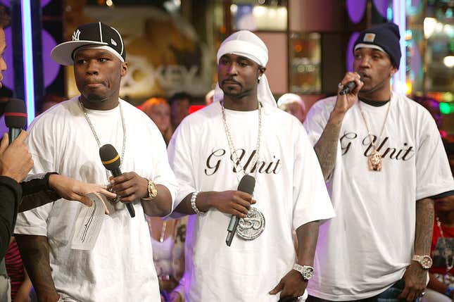 50 Cent and G-Unit appear onstage during “Spankin’ New Music Week” on MTV’s Total Request Live at the MTV Times Square Studios November 13, 2003 in New York City.