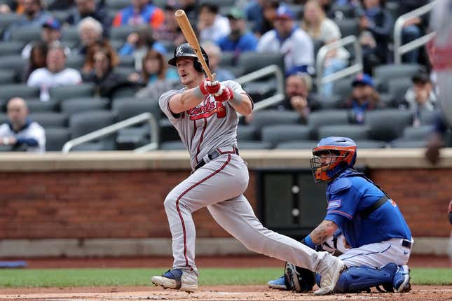 May 1, 2023; New York City, New York, USA; Atlanta Braves catcher Sean Murphy (12) follows through on a three run home run against the New York Mets during the first inning at Citi Field.