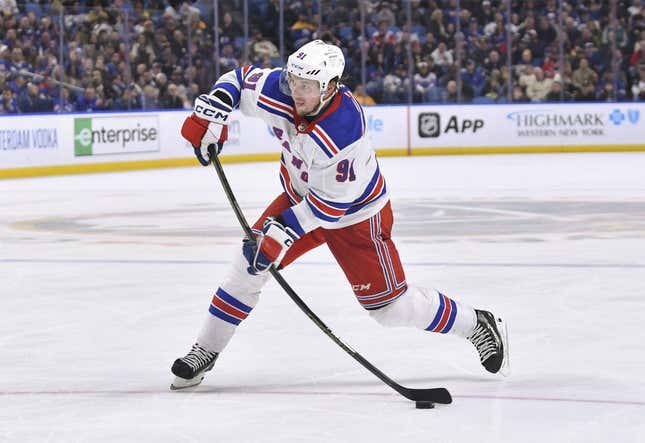Mar 31, 2023; Buffalo, New York, USA; New York Rangers right wing Vladimir Tarasenko (91) takes a slap shot on goal against the Buffalo Sabres in the third period at KeyBank Center.