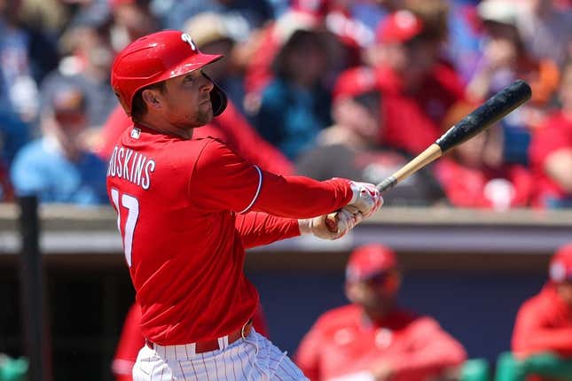Mar 20, 2023; Clearwater, Florida, USA;  Philadelphia Phillies first baseman Rhys Hoskins (17) hits a two-run home run against the Baltimore Orioles in the second inning during spring training at BayCare Ballpark.