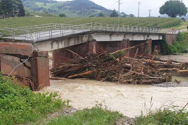 Photo of damaged span and precocious river