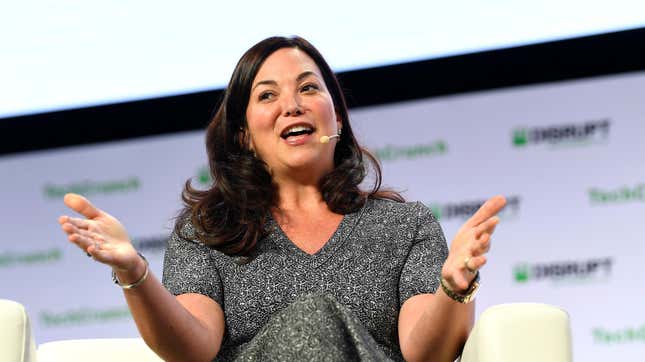 A photo of PagerDuty CEO Jennifer Tejada with her arms out on stage.