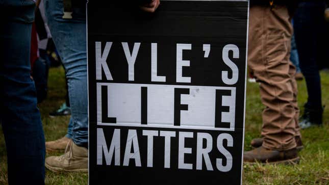 A person holds a sign that reads “Kyle’s Life Matters”, a reference to Kyle Rittenhouse, as several hundred members of the Proud Boys and other similar groups gathered at Delta Park in Portland, Oregon on September 26, 2020. 