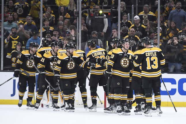 Apr 11, 2023; Boston, Massachusetts, USA; The Boston Bruins celebrate after defeating the Washington Capitals at TD Garden.
