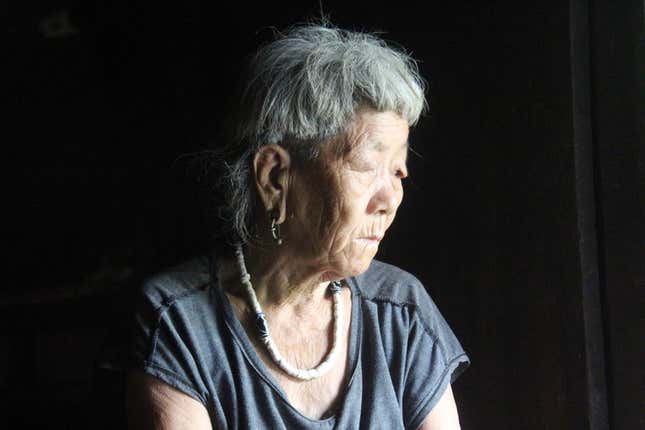 Kherepe Meme looks in the direction of the river Ephe from her home in Kebali village.