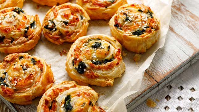 Puff pastry pinwheels on parchment paper