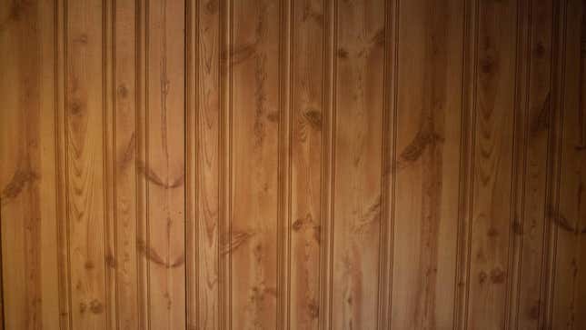 Image for article titled How to Finally Get Rid of That Wood Paneling (or at Least Cover It Up)