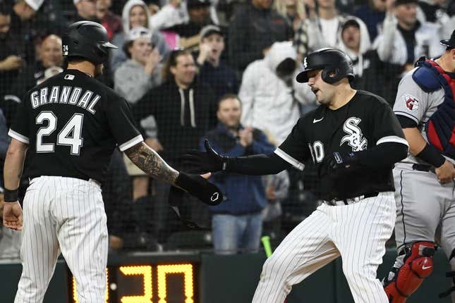 May 17, 2023; Chicago, Illinois, USA;  Chicago White Sox third baseman Jake Burger (30) celebrates with Chicago White Sox catcher Yasmani Grandal (24) after he hits a two-run home run against the Cleveland Guardians during the fourth inning at Guaranteed Rate Field.