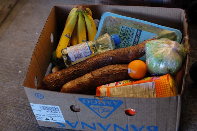 Food sits in a box of free groceries for residents at a food pantry run by La Colaborativa, as the U.S. is cutting benefits delivered through the Supplemental Nutrition Assistance Program (SNAP) by the end of March which kept millions from going hungry through the COVID-19 pandemic, in Chelsea, Massachusetts, U.S., March 8, 2023. 