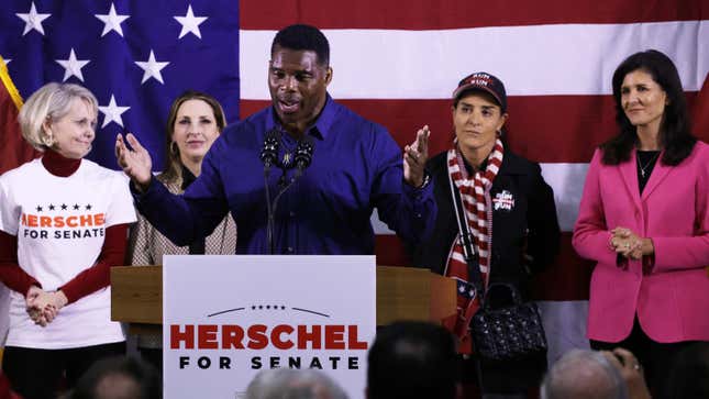 Herschel Walker on Monday night, flanked by (from left to right) Republican National Committeewoman for Georgia Ginger Howard, Republican National Committee Chair Ronna McDaniel, Walker’s wife Julie Blanchard, and former U.S. Ambassador to the U.N. Nikki Haley.