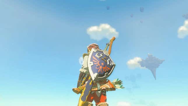 Link is seen with the Hylian Shield on his back.