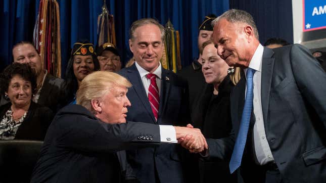 Donald Trump shakes Ike Perlmutter's hand