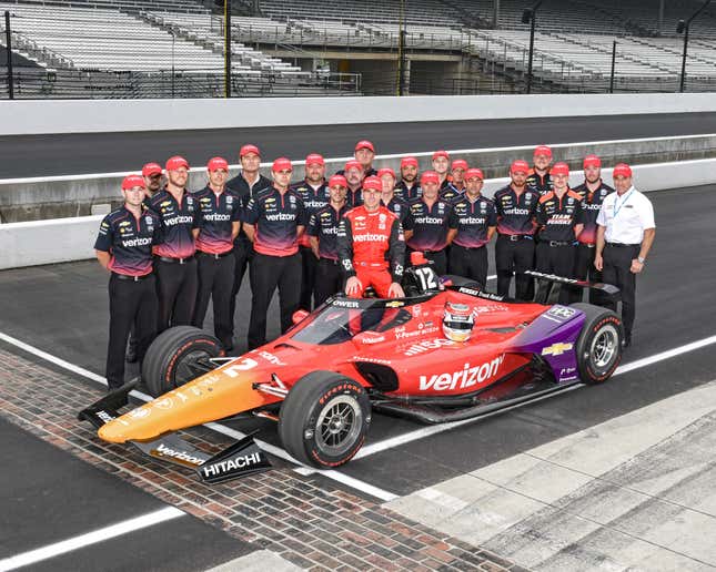 Will Power poses with his pit crew after qualifying for the 2022 Indy 500