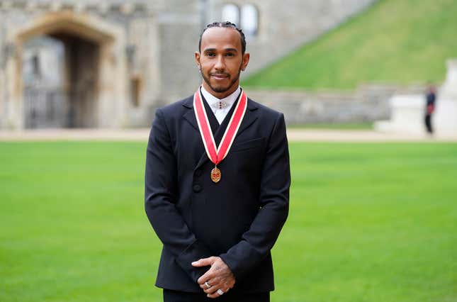  Sir Lewis Hamilton after he was made a Knight Bachelor by the Prince of Wales during an investiture ceremony at Windsor Castle on December 15, 2021 in Windsor, England.