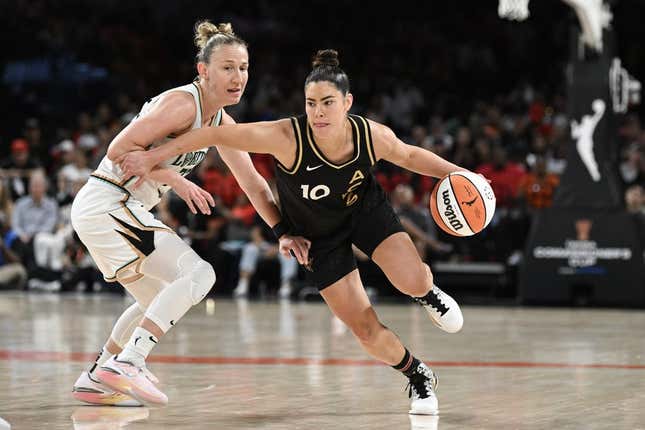 Aug 15, 2023; Las Vegas, Nevada, USA; New York Liberty guard Courtney Vandersloot (22) defends against Las Vegas Aces guard Kelsey Plum (10) during the fourth quarter at Michelob Ultra Arena.